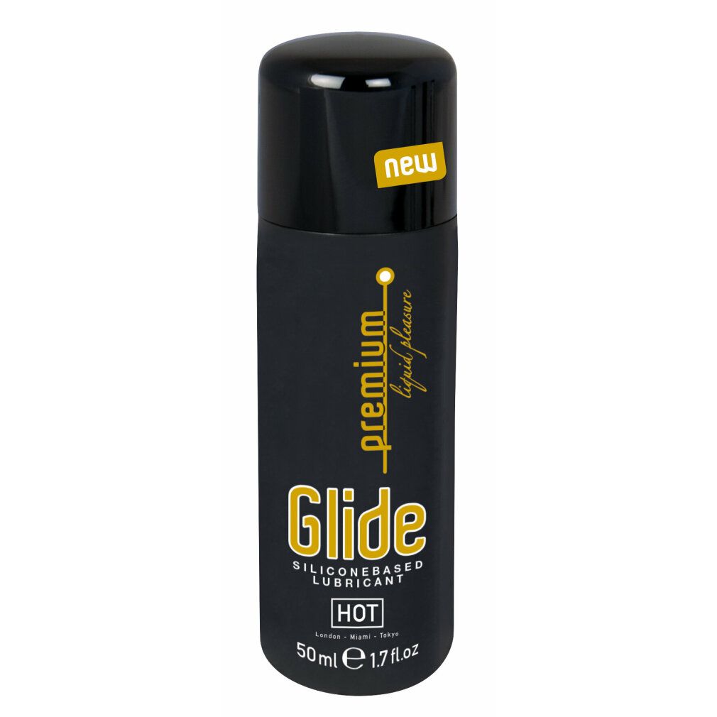 Schwarze Flasche mit gelbem Etikett. Aufschrift 'Glide'. 'New' Aufkleber. 'Hot' Text.