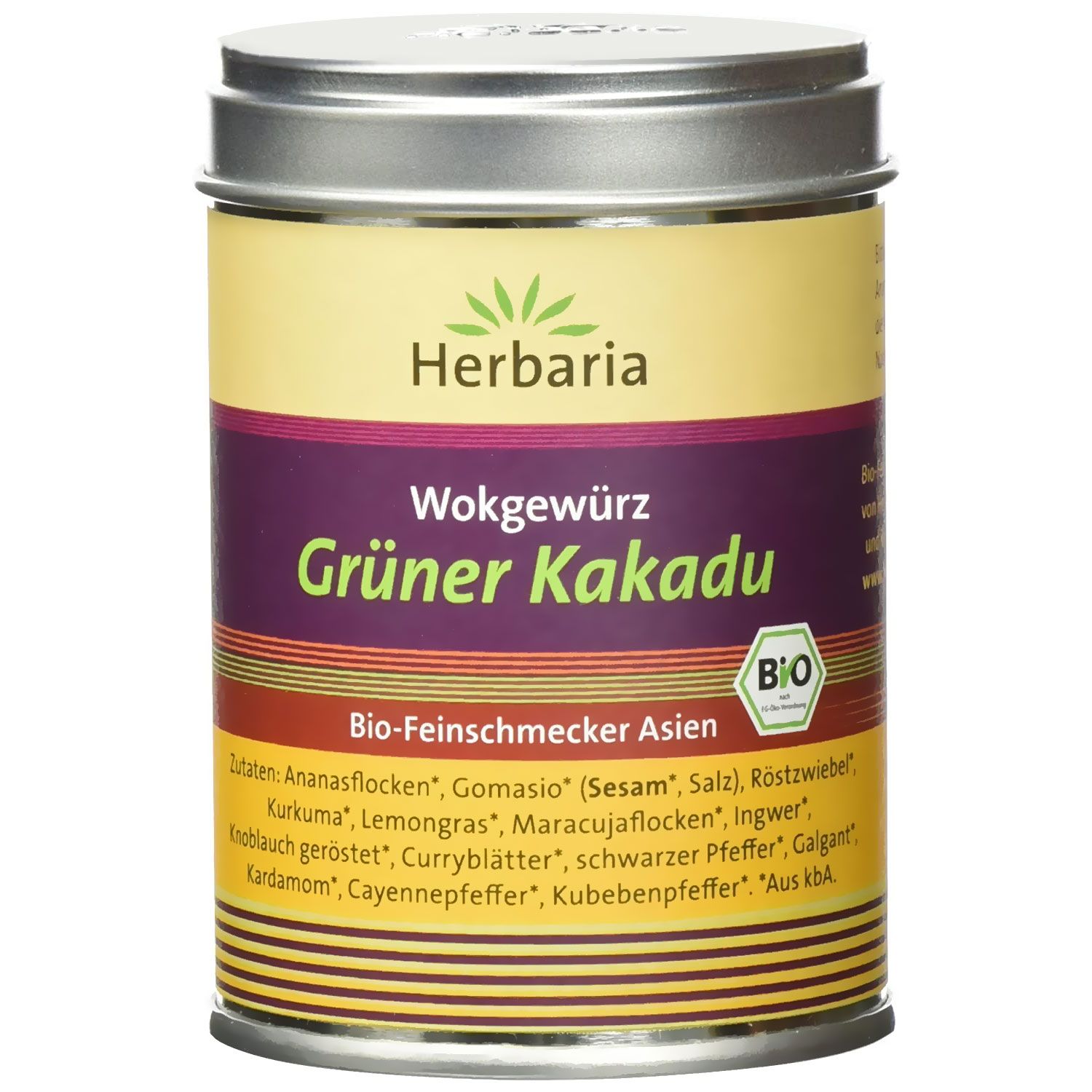 Zylindrische Dose mit Deckel. Aufschrift: Herbaria, Wokgewürz Grüner Kakadu. Bio-Siegel. Zutatenliste.