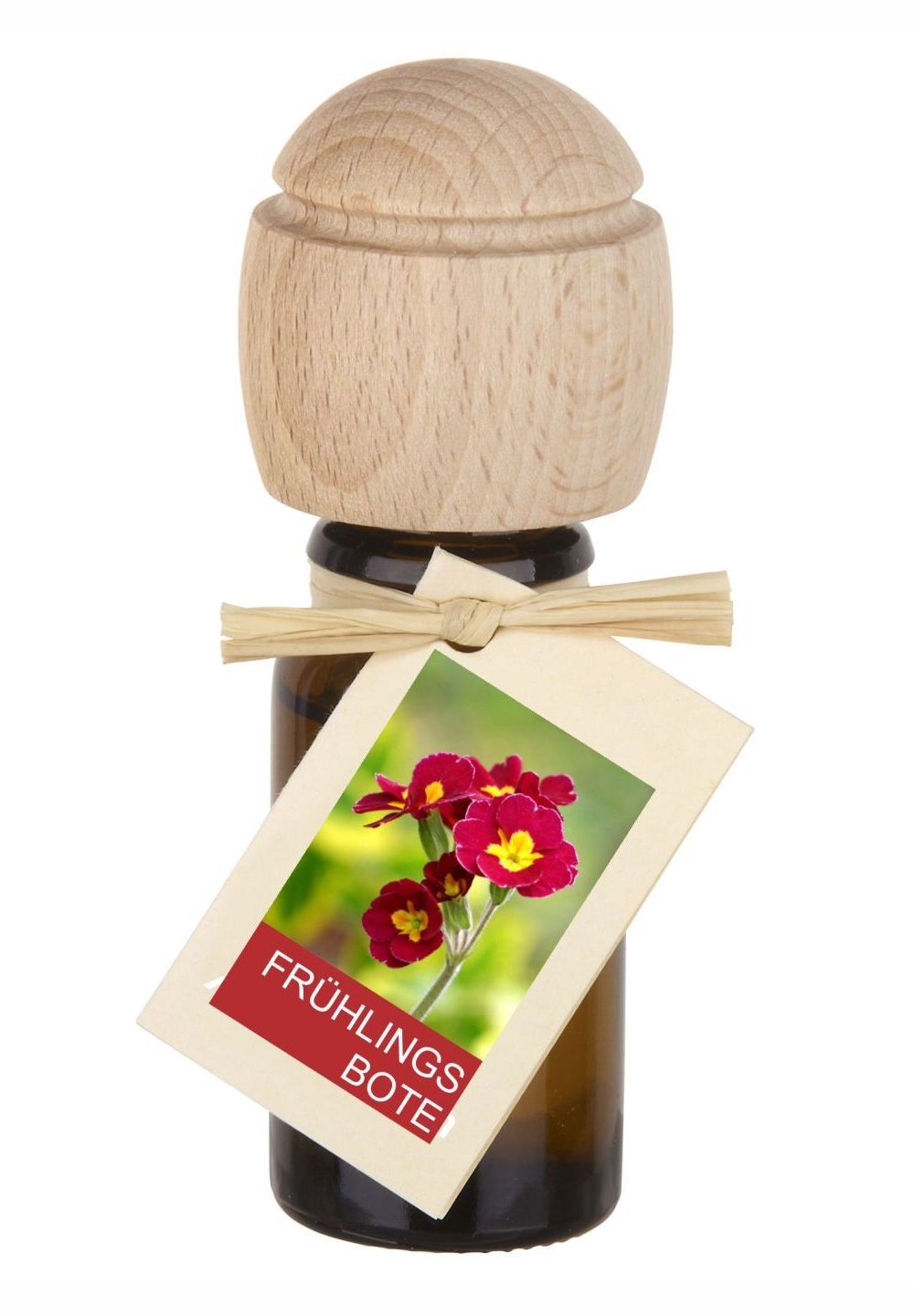 Braune Glasflasche mit Holzverschluss und Anhänger. Anhänger mit Blumenmotiv und Schriftzug FRÜHLINGS BOTE.
