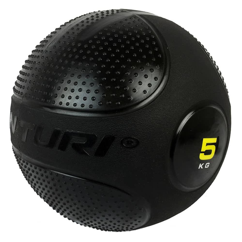 Schwarzer Slam Ball mit Noppenstruktur. Aufschrift Tunturi. Gelbe Markierung mit "5 KG".