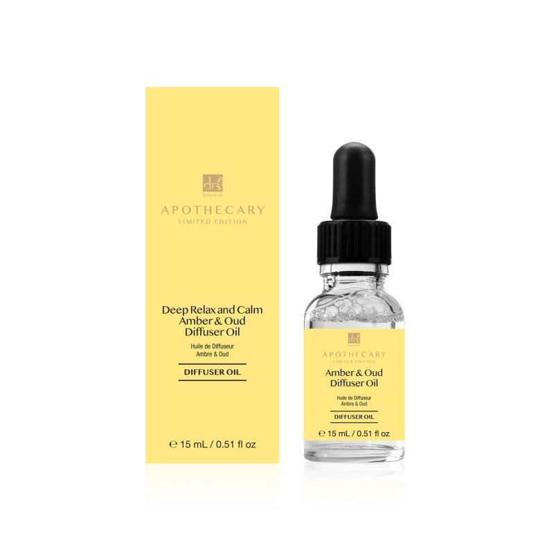 Dr. Botanicals Amber & Oud Diffusoröl in Glasflasche mit Pipette und Umverpackung.