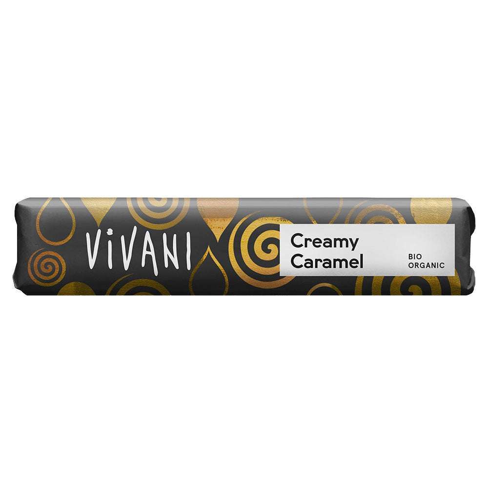 Schokoriegel mit schwarzer Verpackung. Aufschrift: Vivani, Creamy Caramel, Bio Organic. Goldene und weiße Verzierungen.
