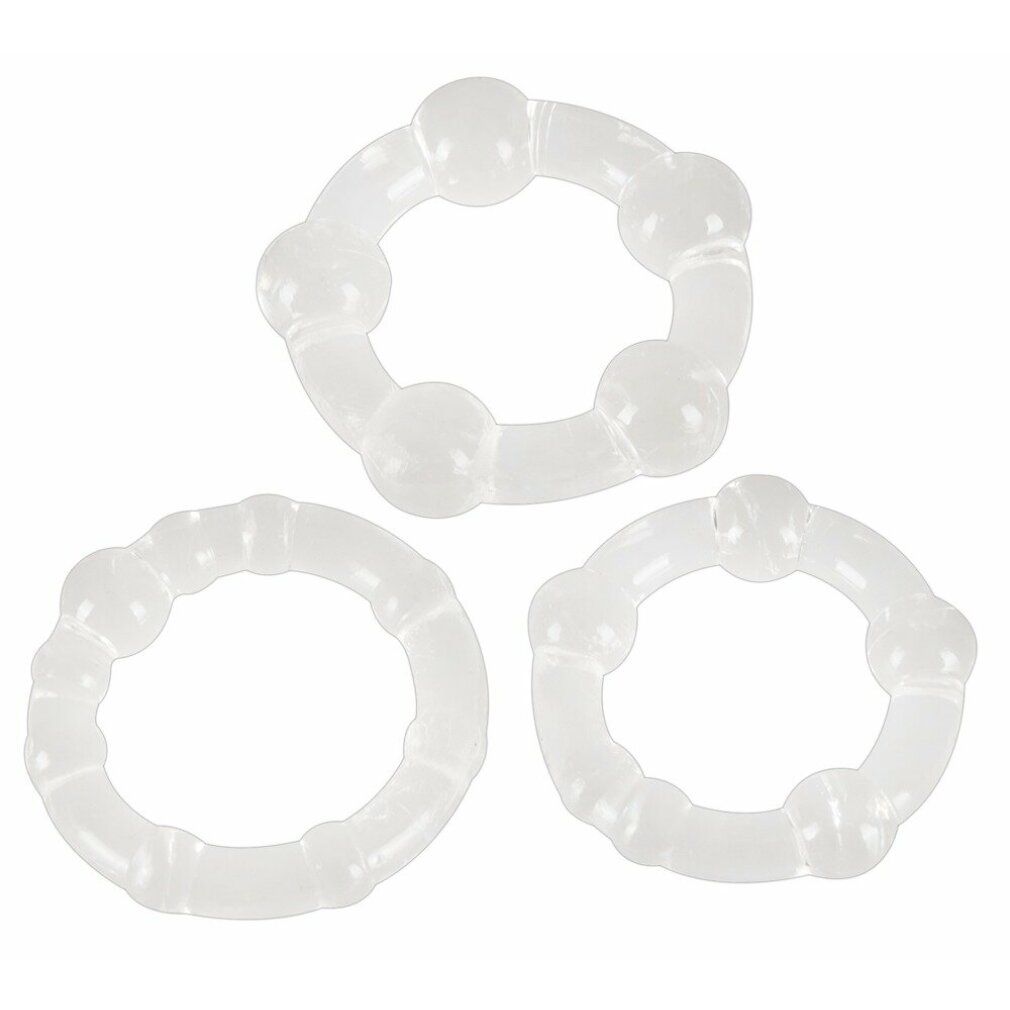 Drei transparente Penisringe. Sie sind aus Silikon gefertigt und haben eine runde Form mit unterschiedlichen Designs.