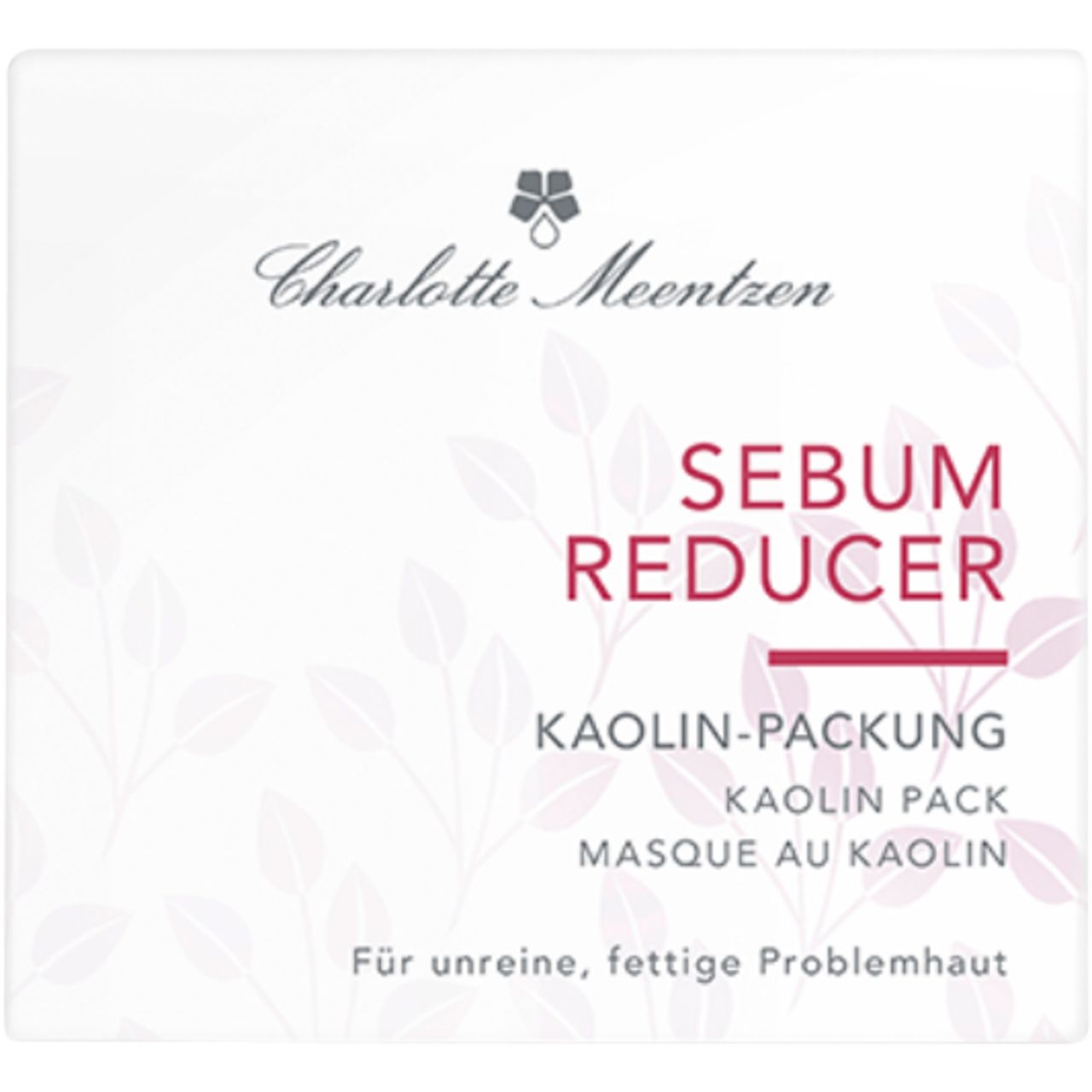 Quadratische Verpackung mit Aufschrift Charlotte Meentzen, SEBUM REDUCER und KAOLIN-PACKUNG. Florales Muster.