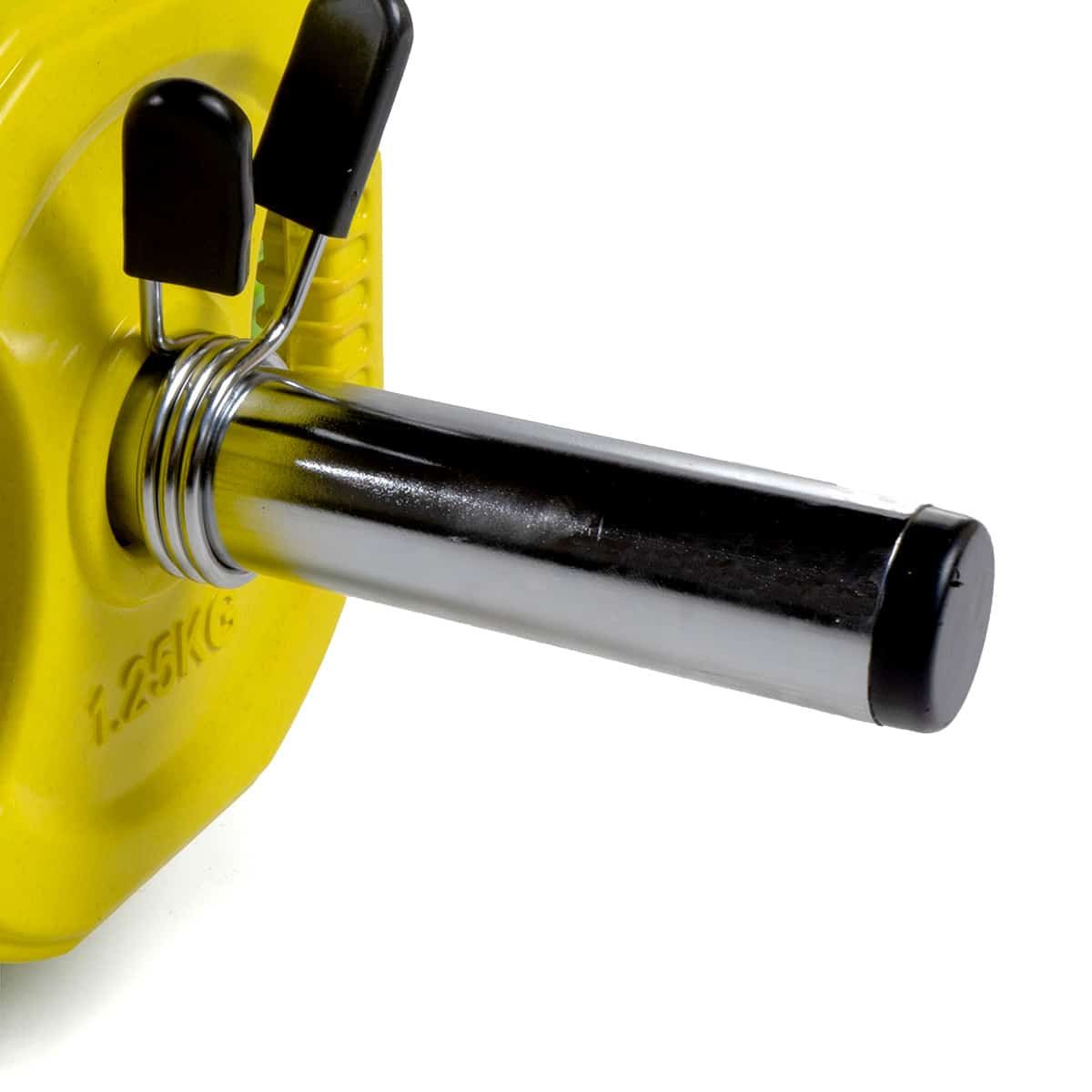 Gelbe Gewichtsscheibe mit schwarzem Stopper. Fitnessgerät.