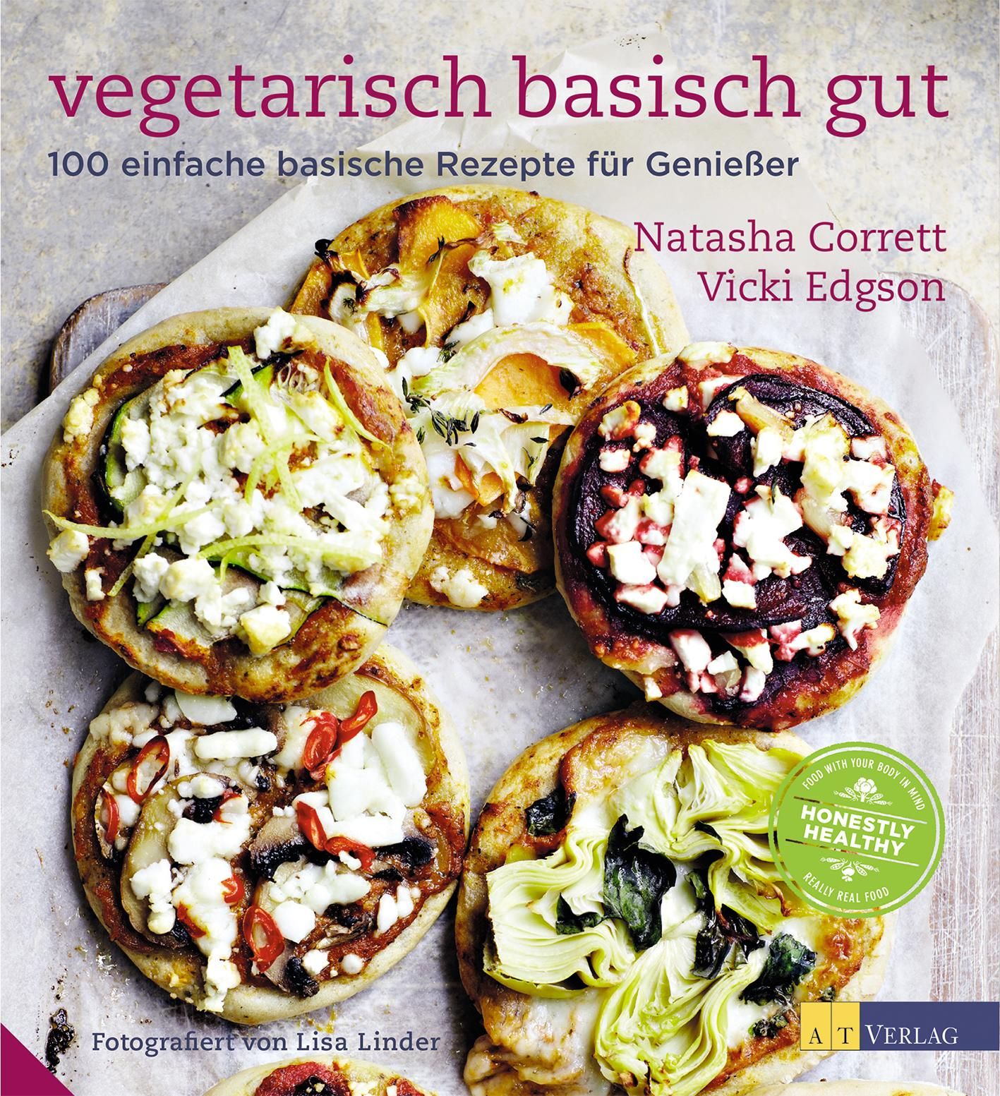 Kochbuch "vegetarisch basisch gut" mit Rezepten. Auf dem Cover sind mehrere kleine Pizzen mit verschiedenen Belägen abgebildet.