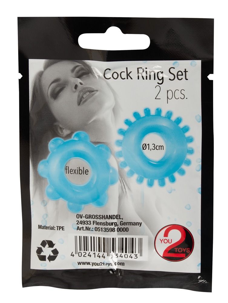 Verpackung mit zwei blauen Penisringen. Aufschrift: "Cock Ring Set 2 pcs." und "Ø1,3cm". Marke: You2Toys.