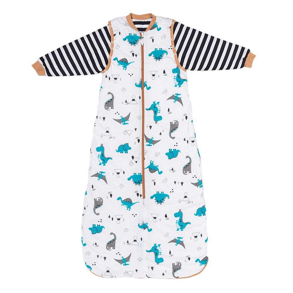 Schlafsack mit Dinosaurier-Muster, Reißverschluss, abnehmbare Ärmel mit Streifen. Beige und blaue Akzente.