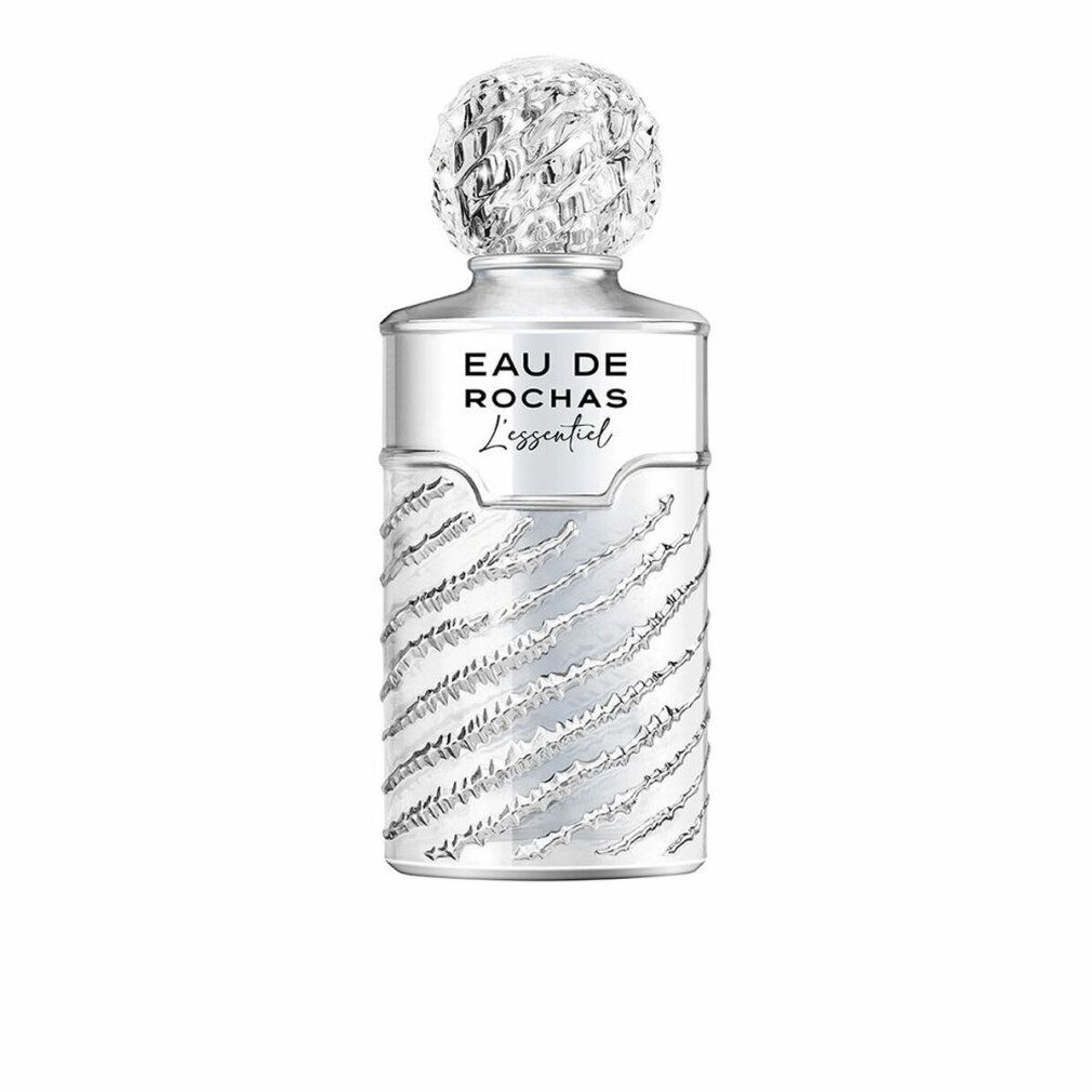 Silberfarbene Flasche mit geriffelter Oberfläche und Kappe. Aufschrift: Eau de Rochas L'Essentiel.