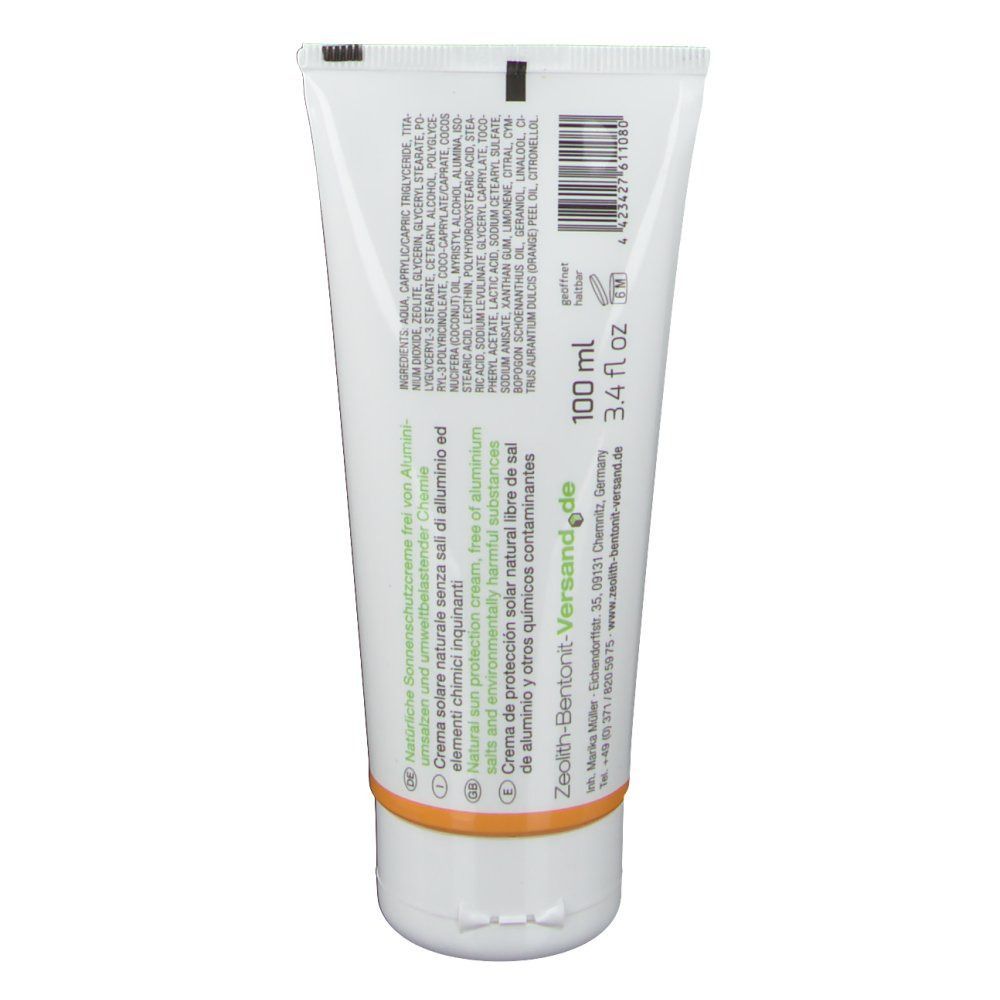 Rückseite der ZeolithMED Sonnencreme Tube. Weiß, orangefarbener Verschluss. Text: 100 ml, 3.4 fl oz. Inhaltsstoffe und Herstellerangaben.