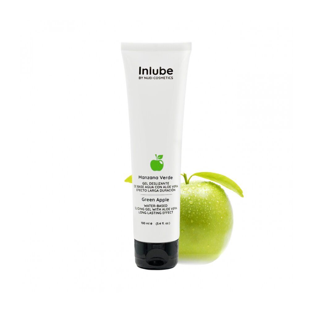 Weiße Tube mit schwarzem Deckel, neben grünem Apfel. Aufschrift: Inlube, Manzana Verde, Green Apple. Produktbezeichnung und Logo.