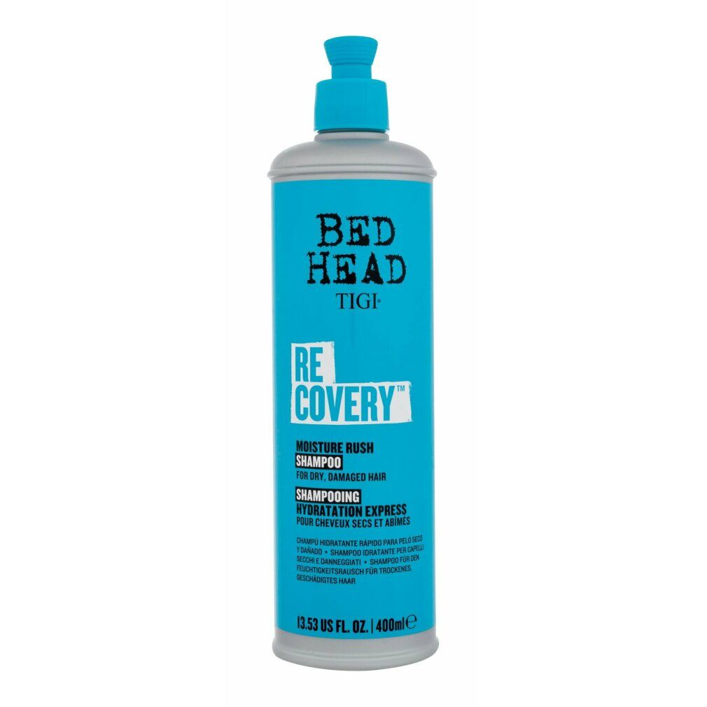 Türkis-farbene Shampoo-Flasche mit blauem Pumpkopf. Aufschrift: BED HEAD TIGI RECOVERY MOISTURE RUSH SHAMPOO.