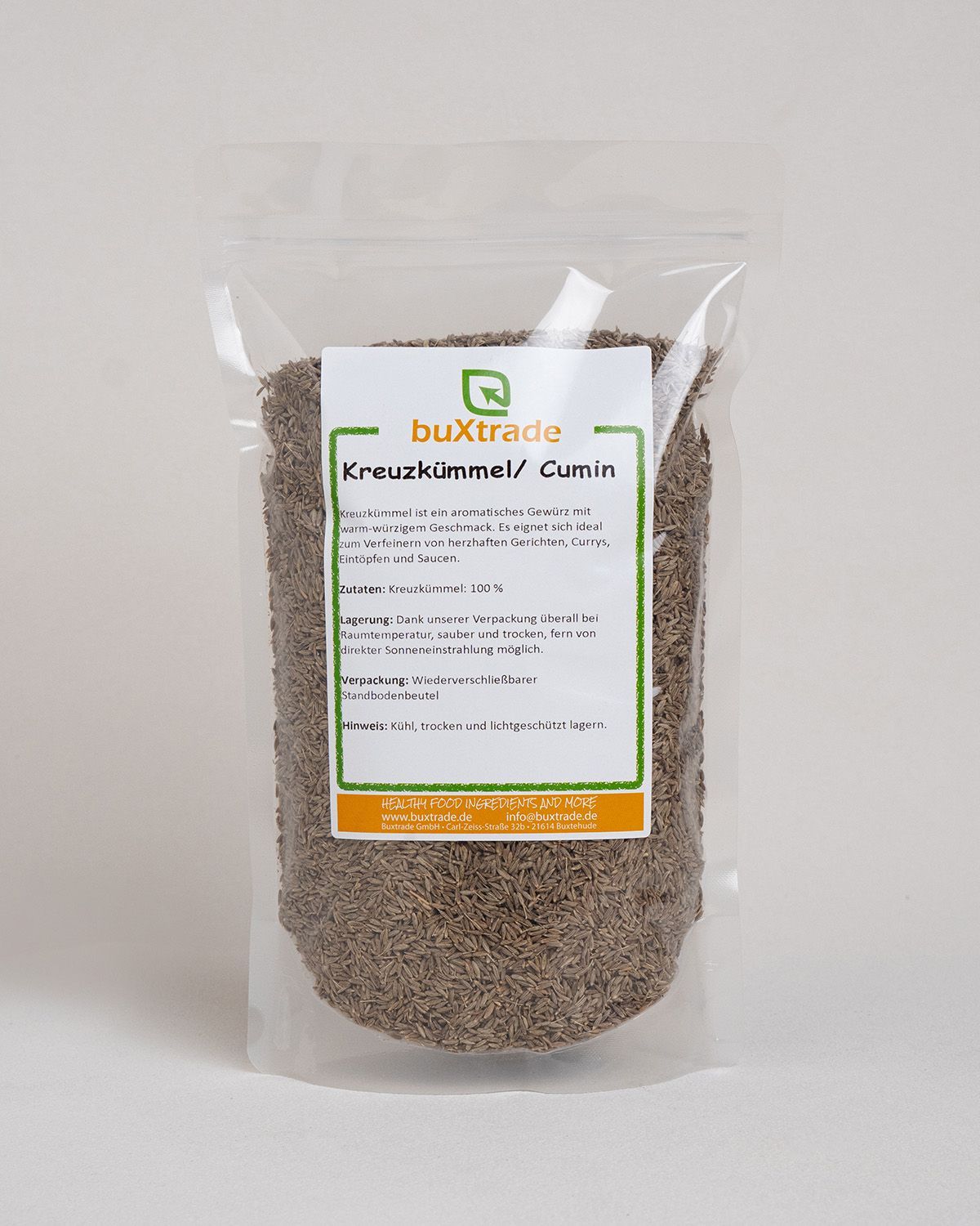 Ein Beutel buxtrade Kreuzkümmel/Cumin mit Etikett.