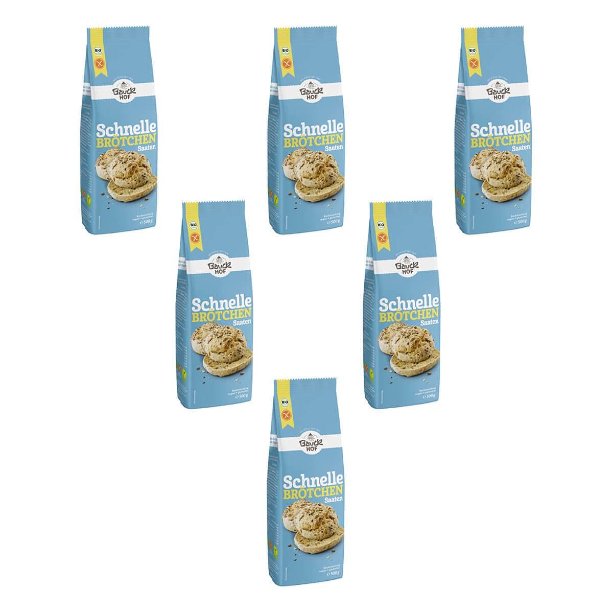 Sieben Packungen Bauckhof Schnelle Brötchen Saaten Backmix, glutenfrei, auf weißem Hintergrund angeordnet.