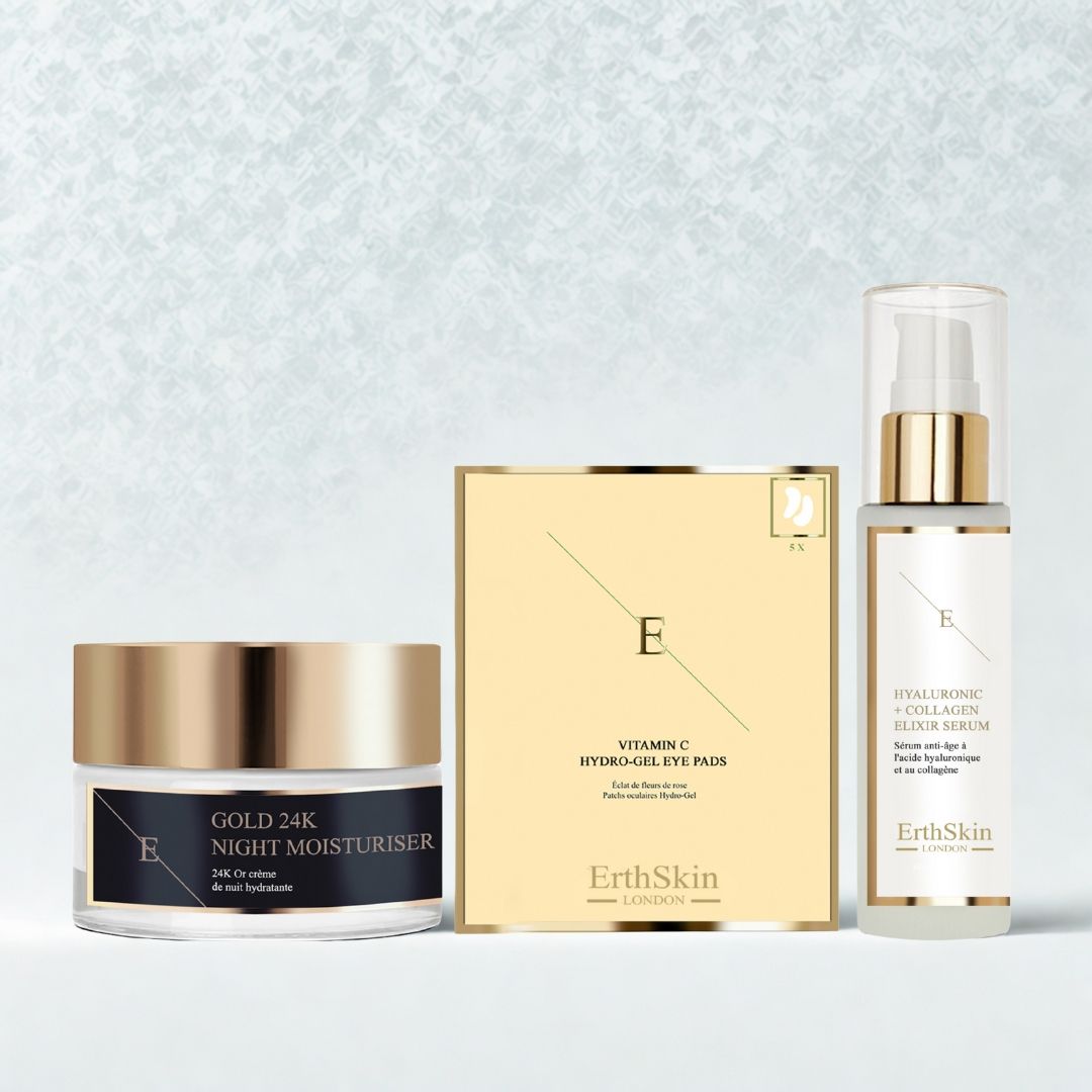 Drei Produkte: Nachtcreme, Augenpads und Serum. Goldfarbene Deckel und Verpackung. Beschriftung: ErthSkin London, Gold 24K Night Moisturiser, Vitamin C Hydro-Gel Eye Pads, Hyaluronsäure + Collagen.