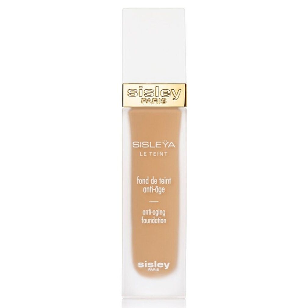 Sisley Sisleya Le Teint Foundation. Rechteckige Flasche mit weißem Deckel. Goldener Schriftzug Sisley Paris. Anti-Aging-Foundation.