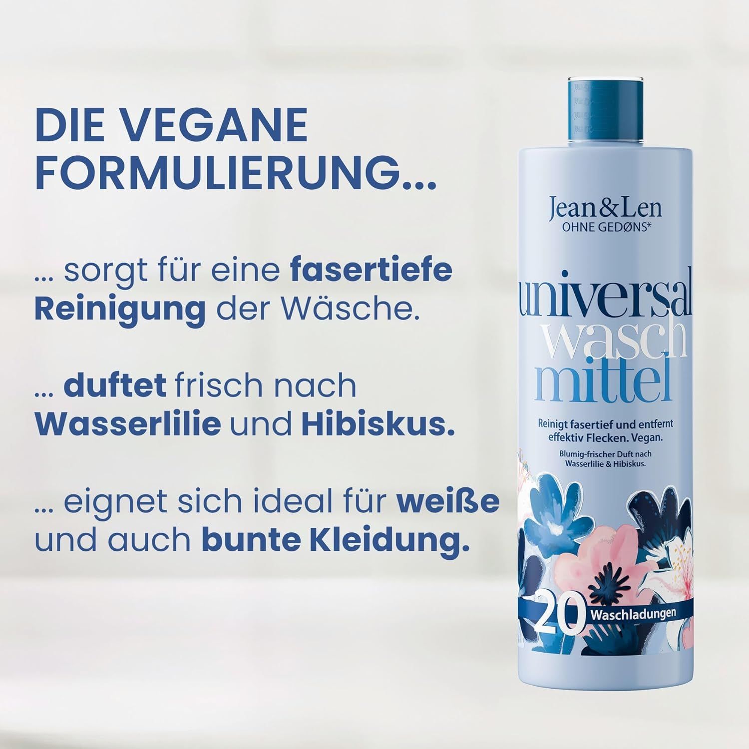 Hellblaue Flasche mit floralem Design. Text: Jean & Len Universalwaschmittel, 20 Waschladungen. Text über vegane Formel.