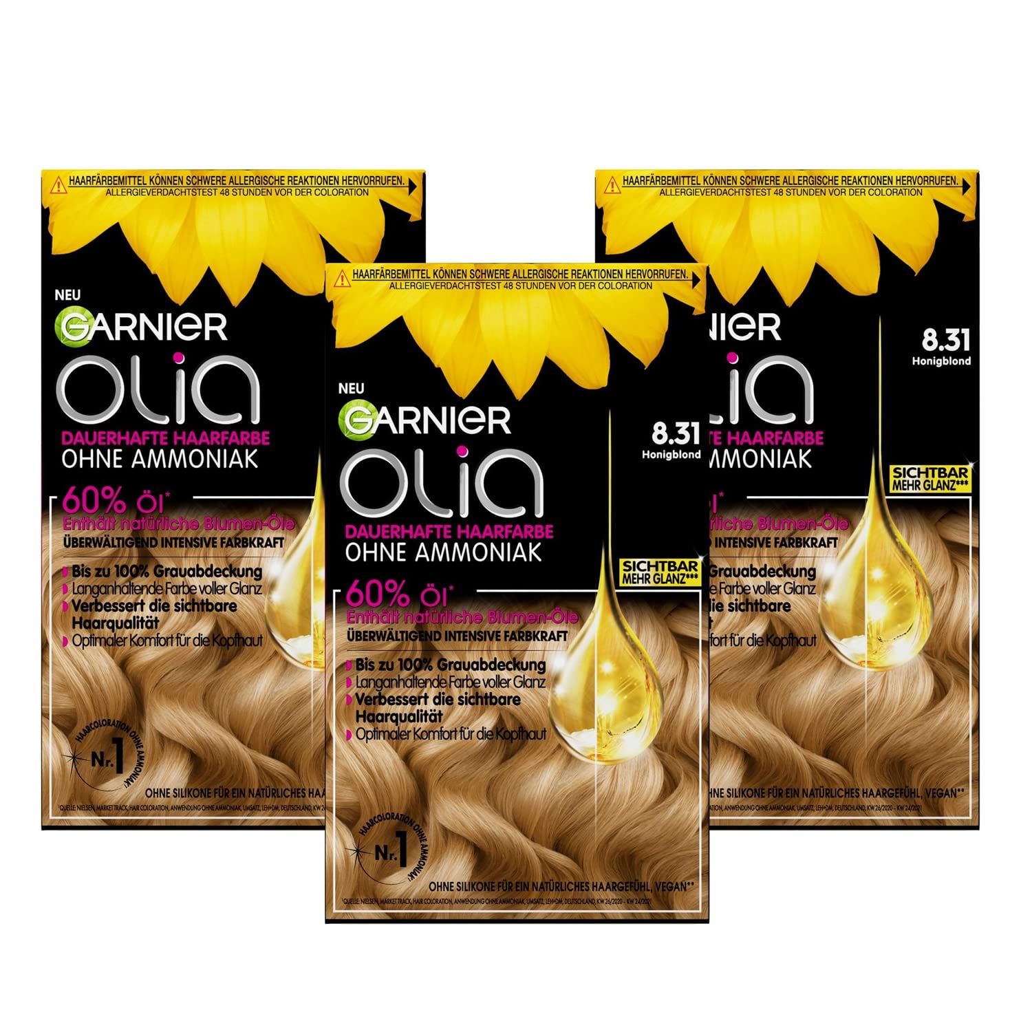 Drei Packungen Garnier Olia Haarfarbe. Honigblond, ohne Ammoniak. Aufdrucke: 60% Öle, 8.31, dauerhafte Haarfarbe.
