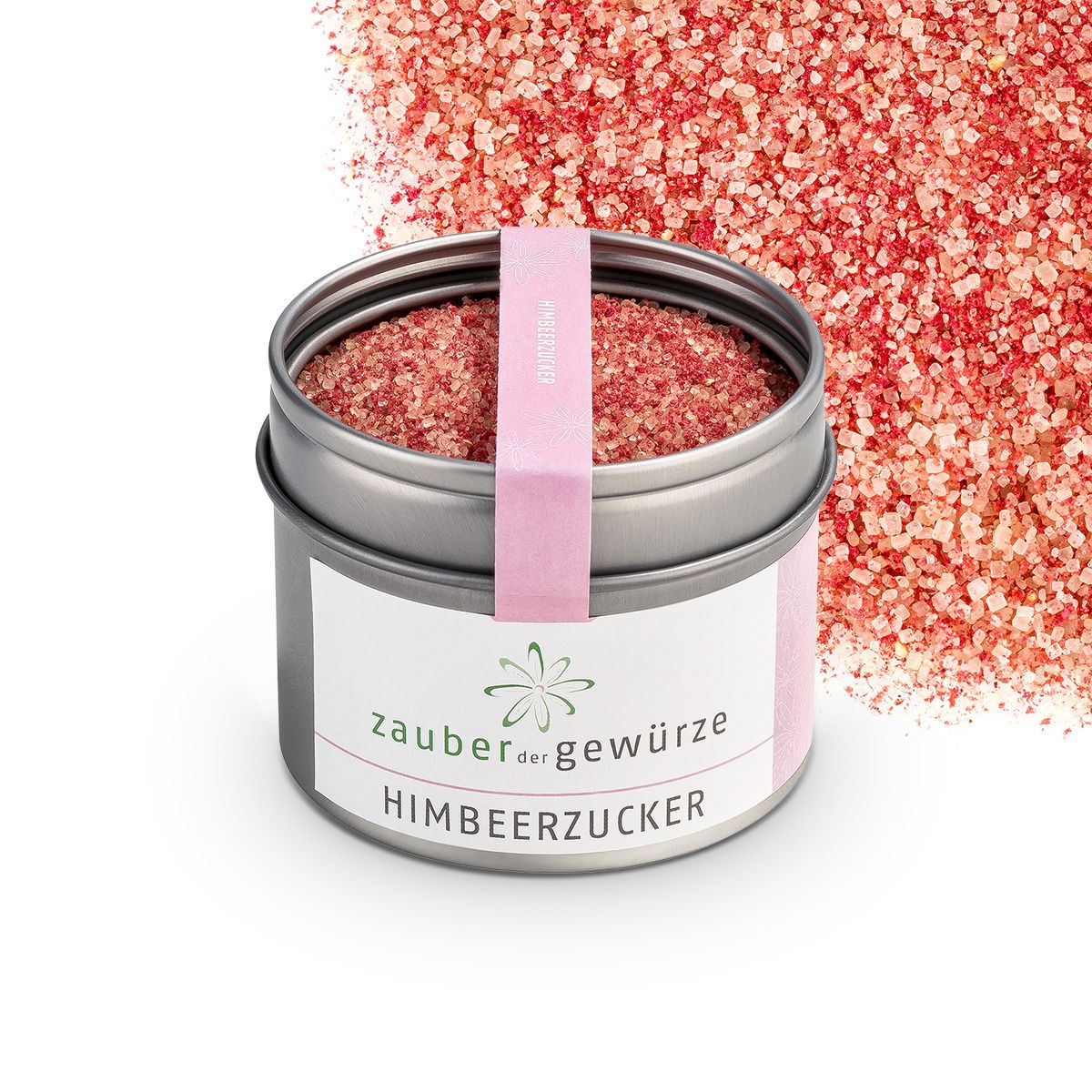 Dose mit Himbeerzucker. Rosa Zucker. Rosa Etikett mit Schriftzug. Marke: Zauber der Gewürze. Hintergrund: Rosa Zuckerstreuung.