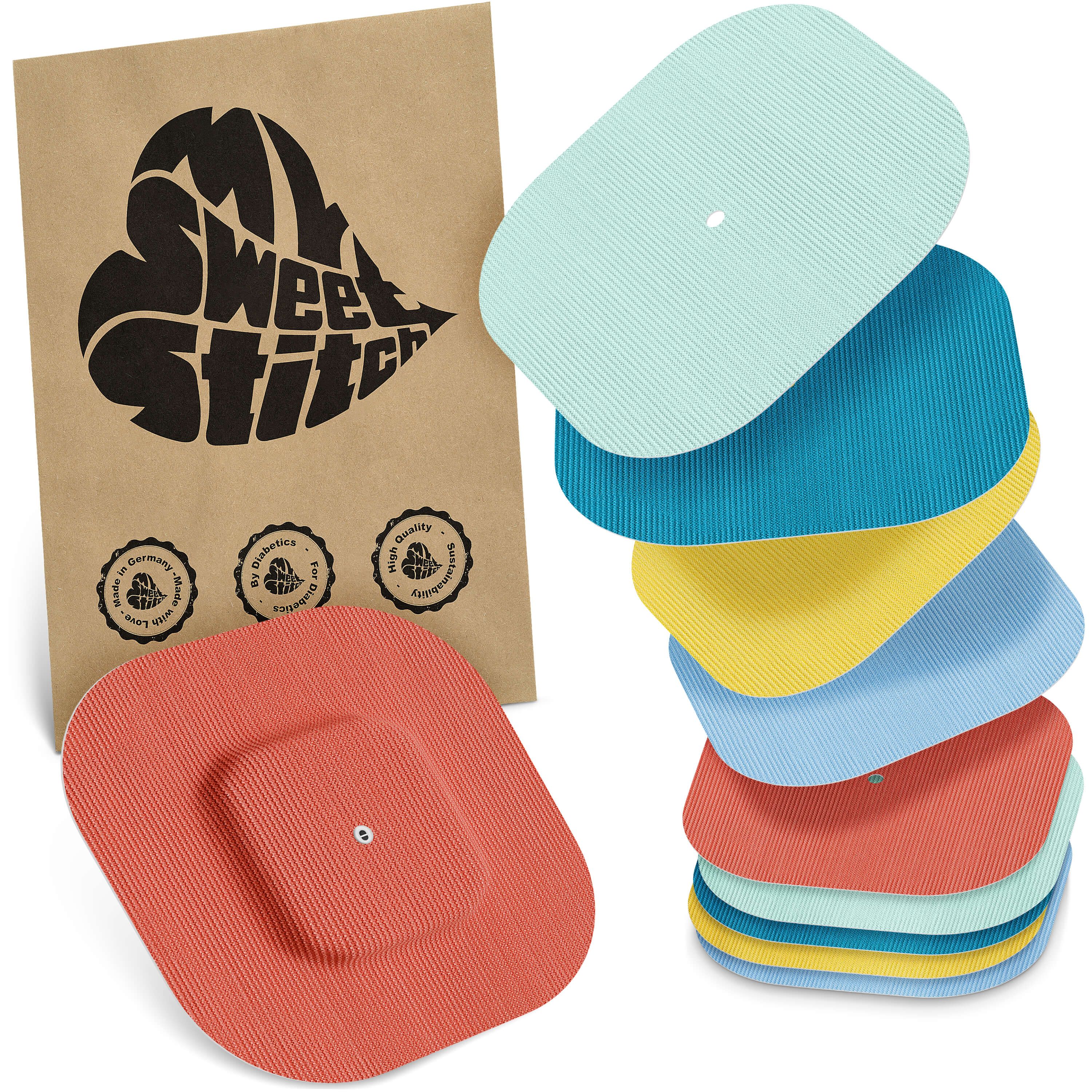 Verpackung mit Logo. Mehrere farbige, quadratische Pflaster. Ein rotes Pflaster mit quadratischer Mitte. Siegel mit Text.