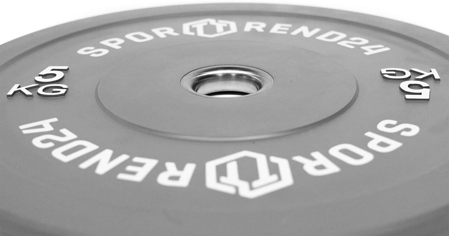 Graue Sporttrend24 Bumper Plate. Weißer Schriftzug: Sporttrend24 und 5 KG. Runde Form mit Loch in der Mitte. Nahaufnahme.
