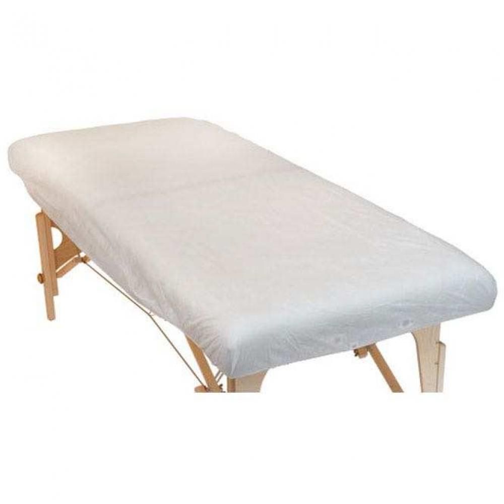 Weißes Einweg-Spannlaken aus Vlies auf einer Massageliege. Das Laken bedeckt die gesamte Liegefläche.