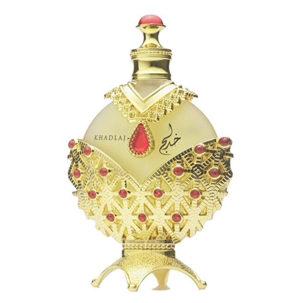 Goldfarbene Flasche mit rotem Schmuck. Aufschrift: KHADLAJ. Konzentriertes Ölparfüm.