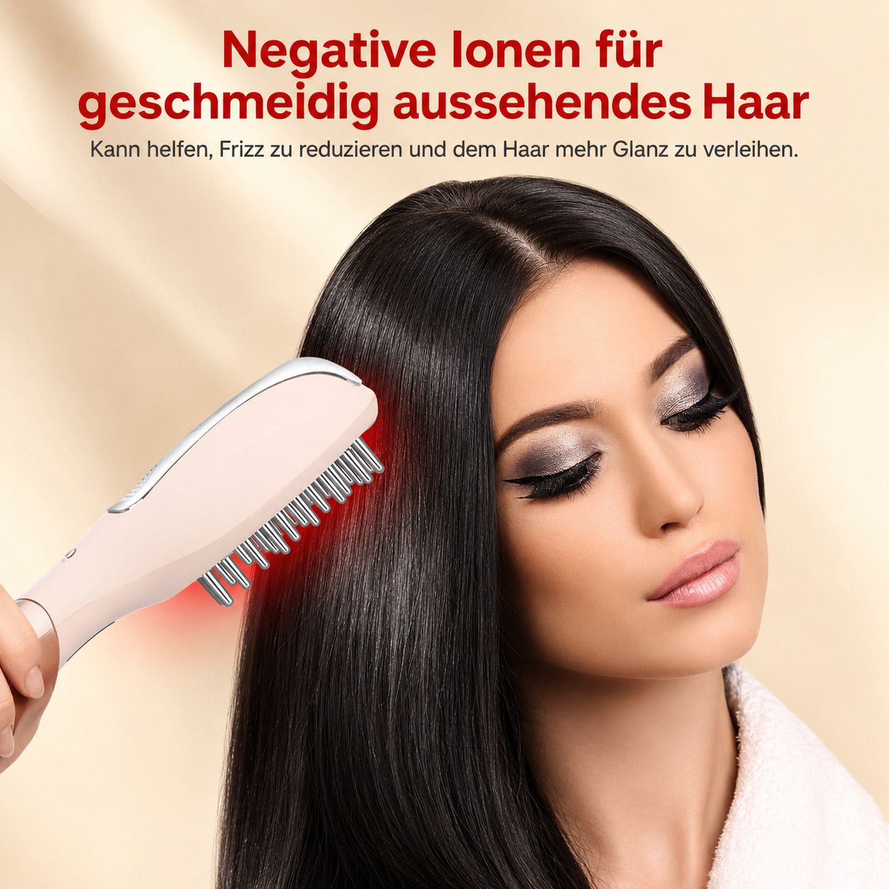 Rosa Massagebürste mit roten LEDs für geschmeidiges Haar und Glanz.