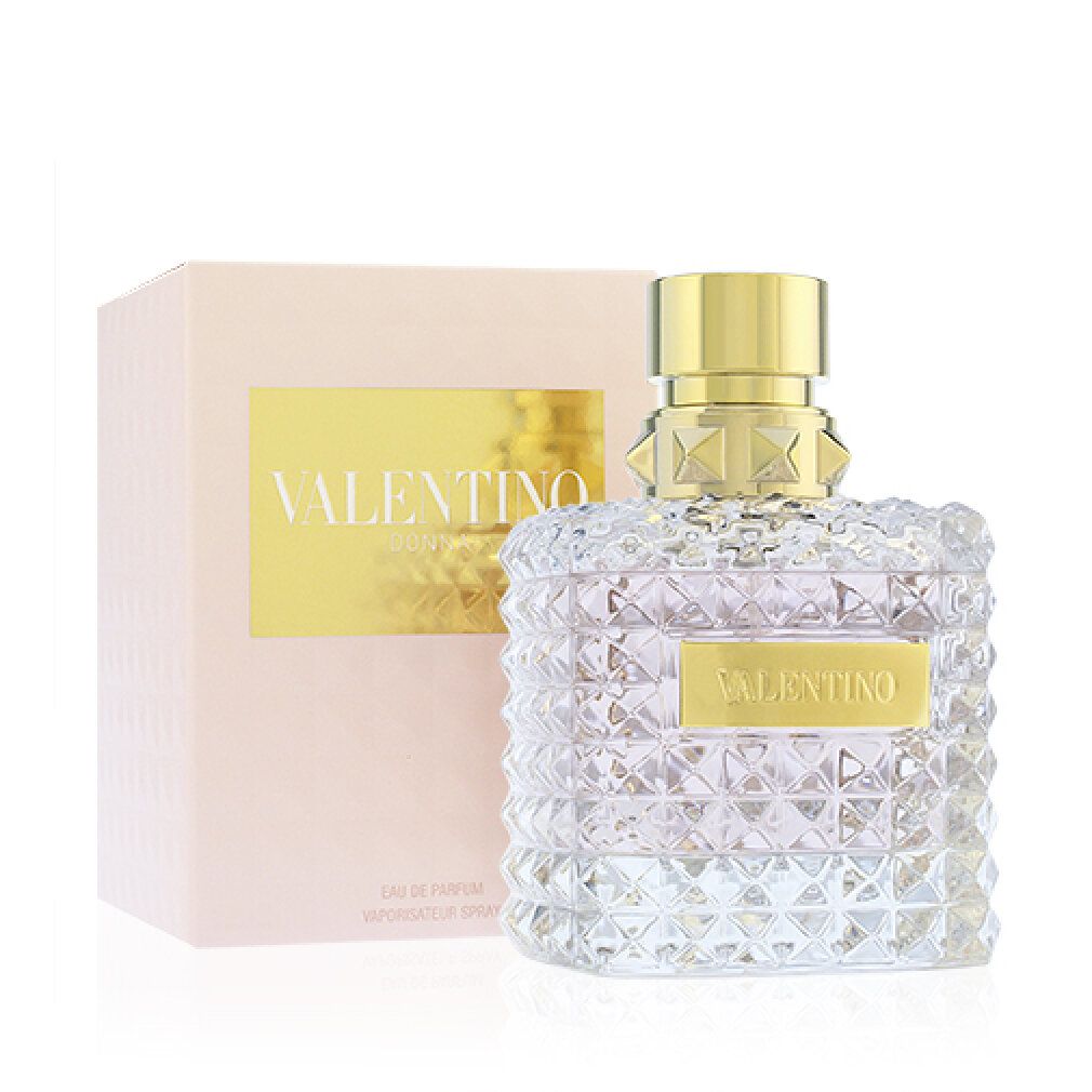 Parfümflakon und Verpackung. Flakon mit goldfarbenem Verschluss und quadratischem Design. "VALENTINO" Schriftzug.