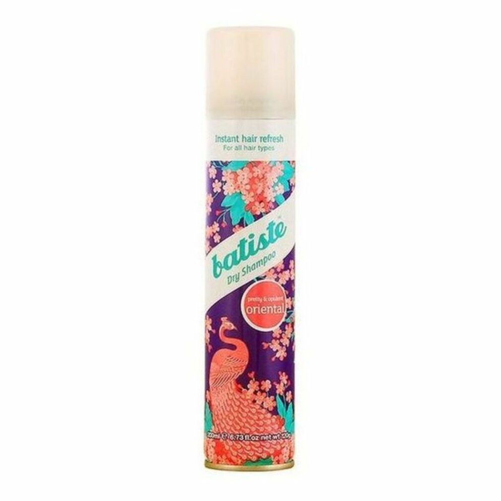 Batiste Trockenshampoo. Zylindrische Dose mit floralem Muster und Pfau. Aufschrift: "Oriental".