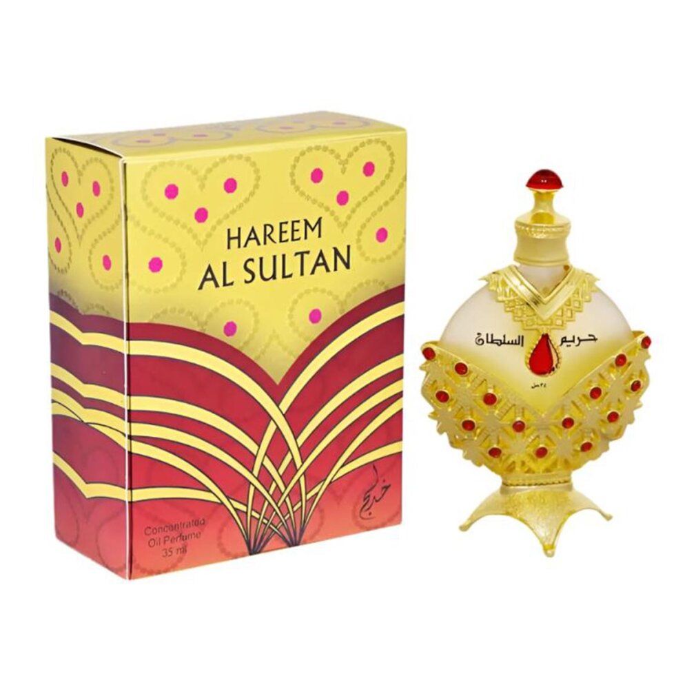 Goldfarbene Flasche mit rotem Schmuck und Karton. Aufschrift: HAREEM AL SULTAN. Konzentriertes Ölparfüm.