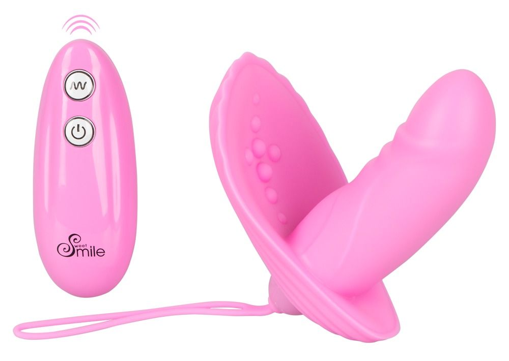 Rosa Vibrator mit Fernbedienung. Vibrator mit zwei Teilen und Fernbedienung. Aufschrift: Smile. Funktionen: Vibration.