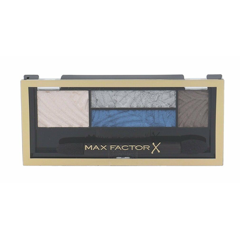 Lidschatten-Palette mit fünf Farben, blau und braun. Goldfarbene Umrandung, schwarzer Applikator. Schriftzug: MAX FACTOR.