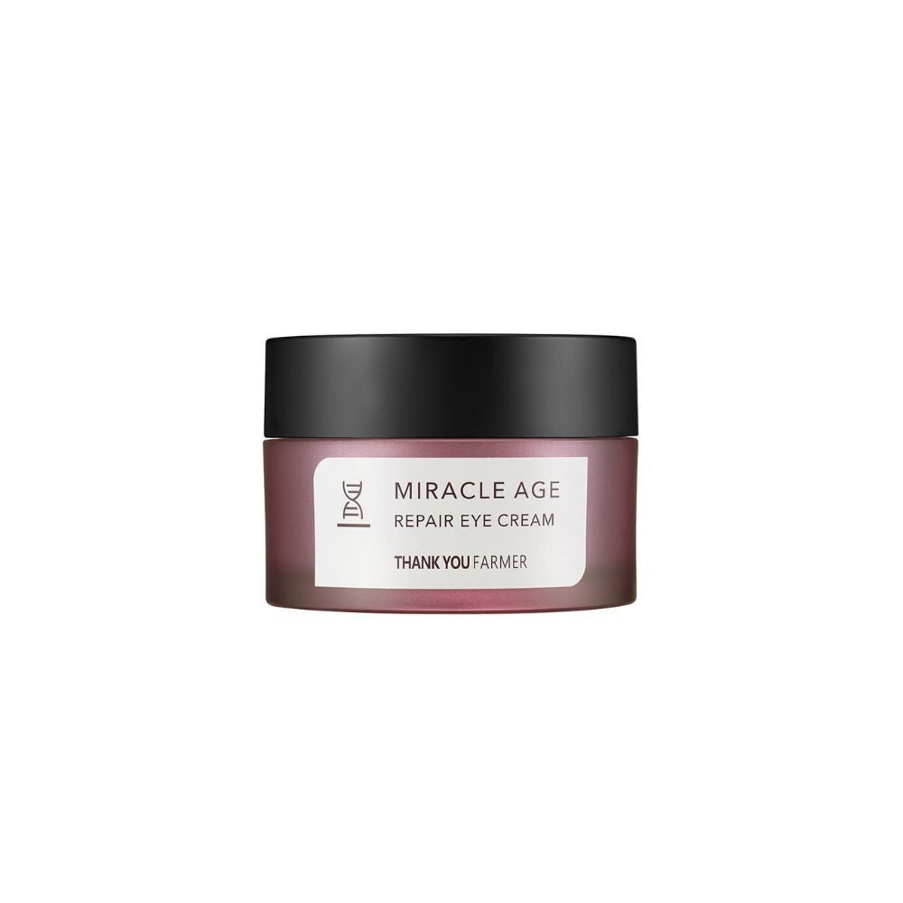 Augencreme-Tiegel mit schwarzem Deckel. Auf dem Etikett steht "MIRACLE AGE REPAIR EYE CREAM" und "THANK YOU FARMER".