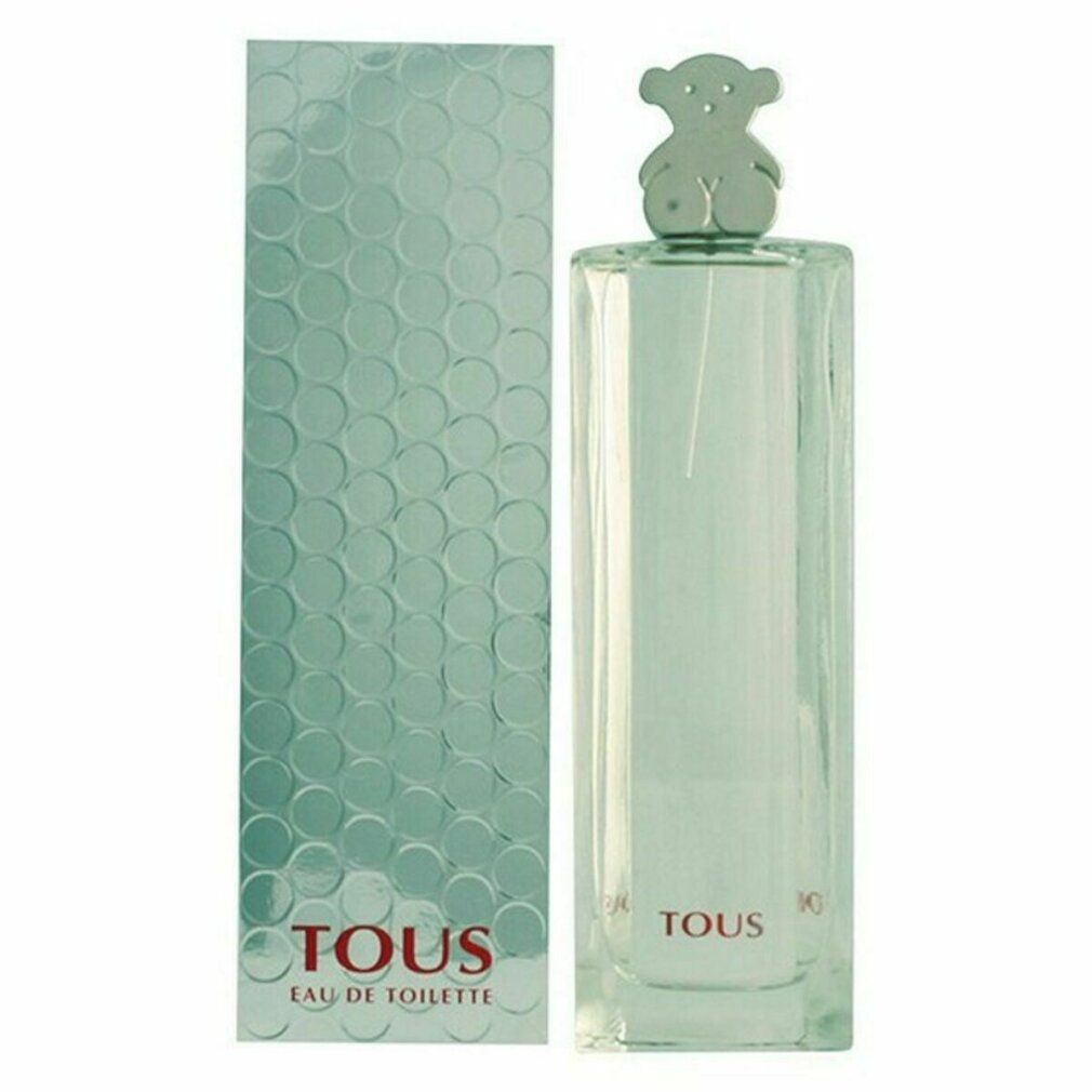 Flakon mit silbernem Bären-Verschluss und Verpackung. Aufschrift: TOUS Eau de Toilette. Grüner Hintergrund.
