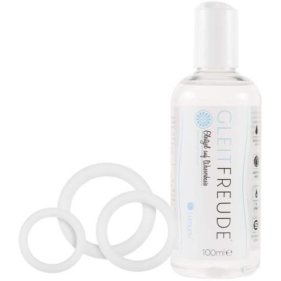 Drei weiße Silikonringe und eine Flasche Gleitmittel. Auf der Flasche steht "Gleitfreude" und "100ml".