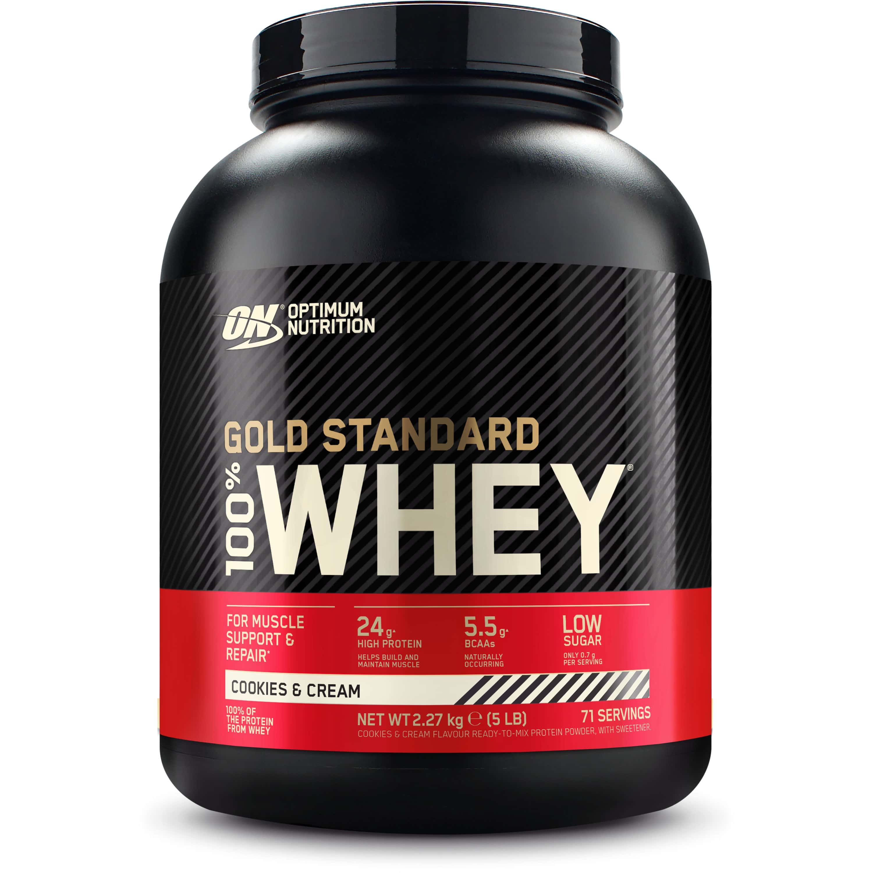 Schwarzer Behälter mit rotem Band. Aufschrift: Gold Standard 100% Whey, Cookies & Cream. 2,27 kg (5 lb).
