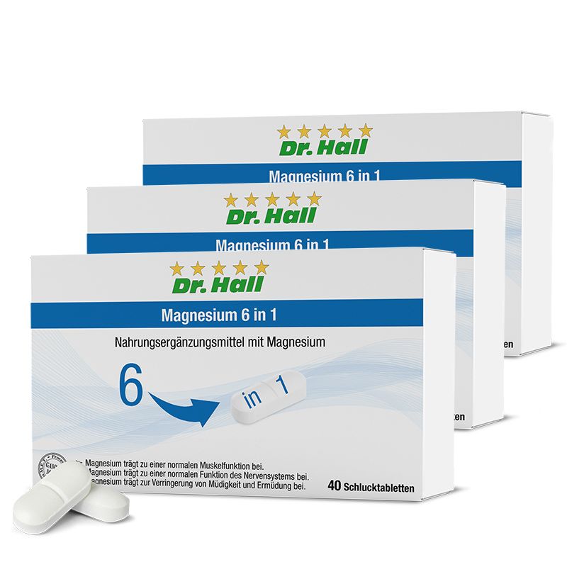 Drei Schachteln Dr. Hall Magnesium 6 in 1. Weiße Verpackung mit blauem Streifen und Produktinformationen. Zwei Tabletten liegen davor.