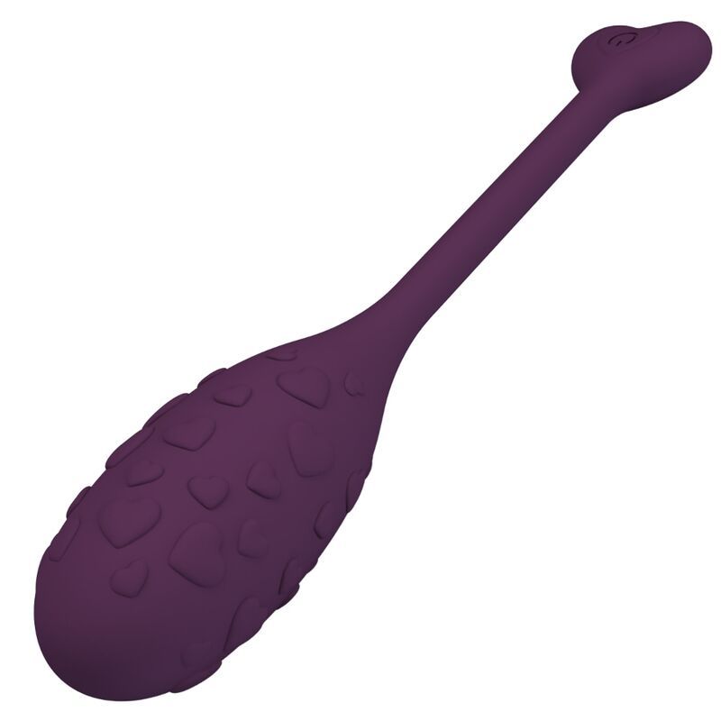 Lila Ei-förmiges Produkt mit Herz-Form am Ende. Oberfläche mit Herz-Mustern. Mit langem Stiel und Herz-förmigem Ende.