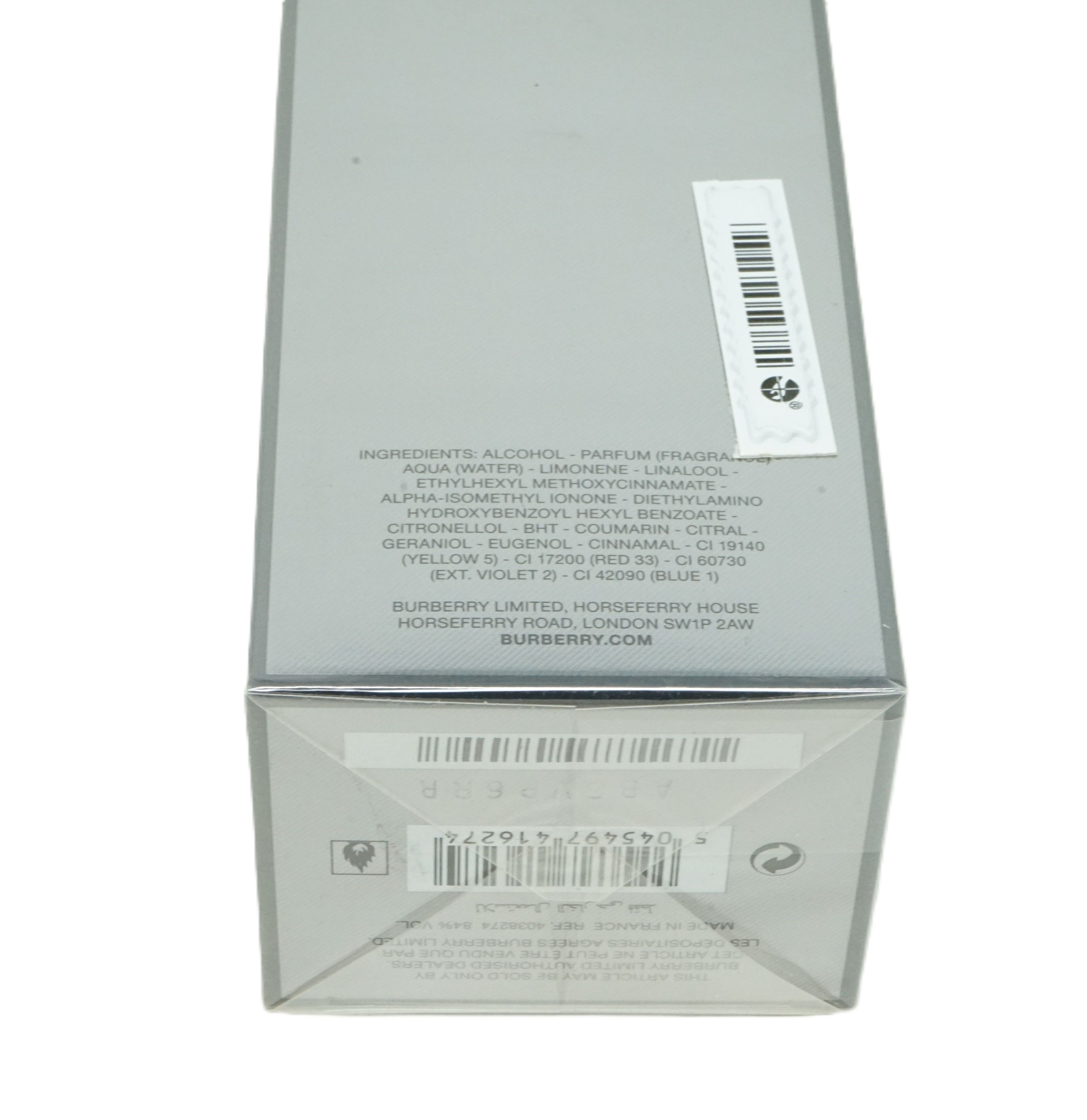 Verpackung mit Inhaltsstoffen und Barcode. Text: BURBERRY.COM. Aufkleber mit Barcode.