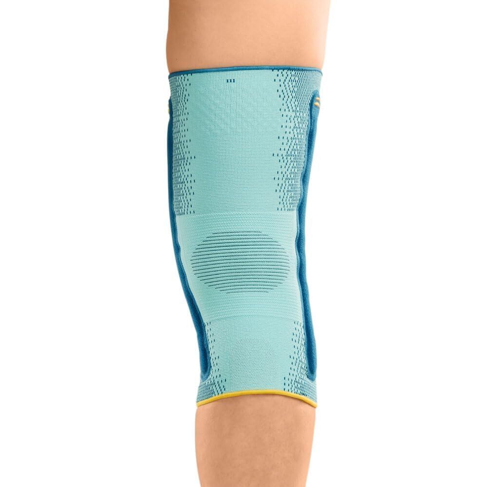 Knieorthese Medi Genumedi® PT, blau-türkis. Mit seitlichen Schienen und gelben Akzenten. Am Bein getragen.