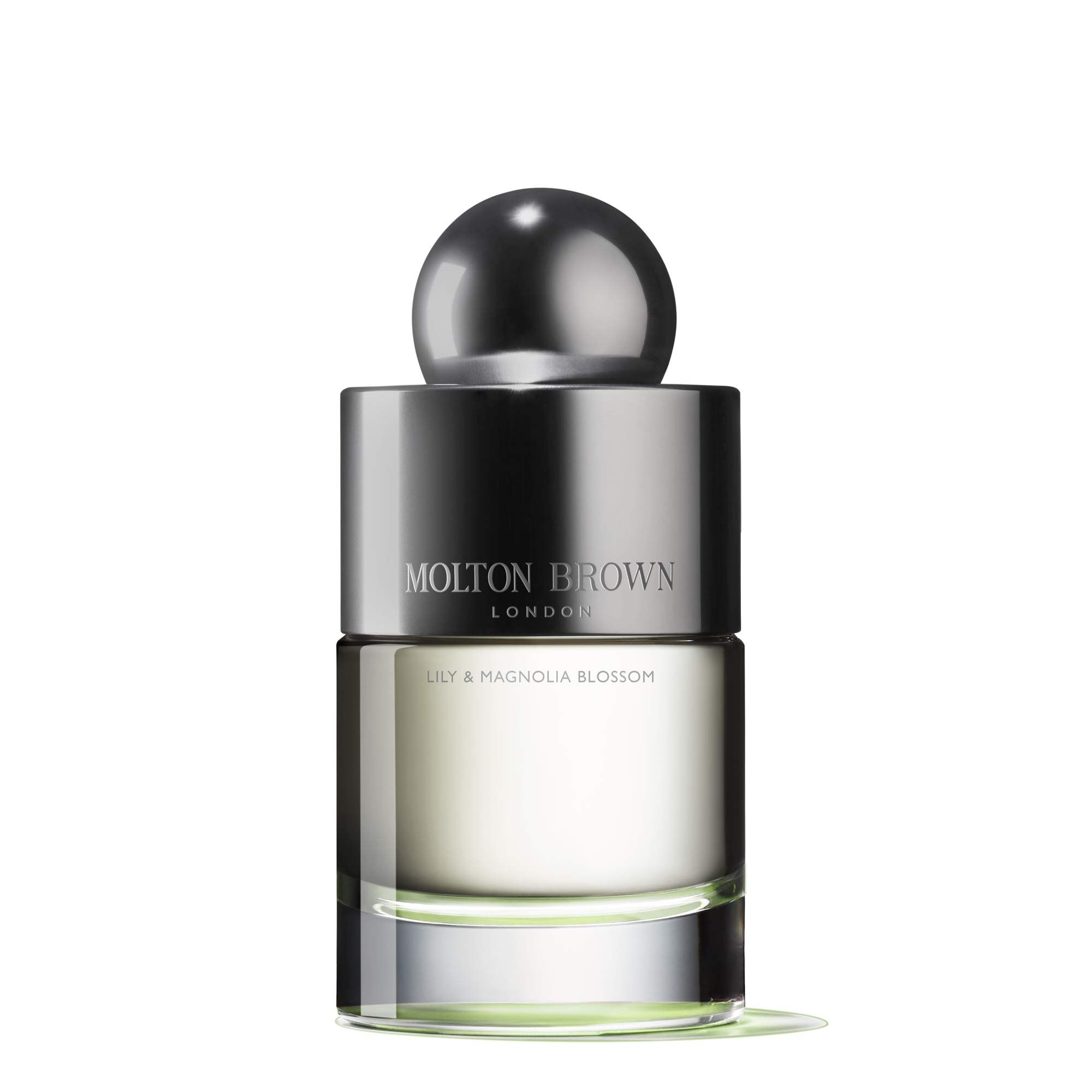 Molton Brown Lily & Magnolia Blossom Eau de Toilette. Flakon mit silberner Kappe, klare Flüssigkeit.
