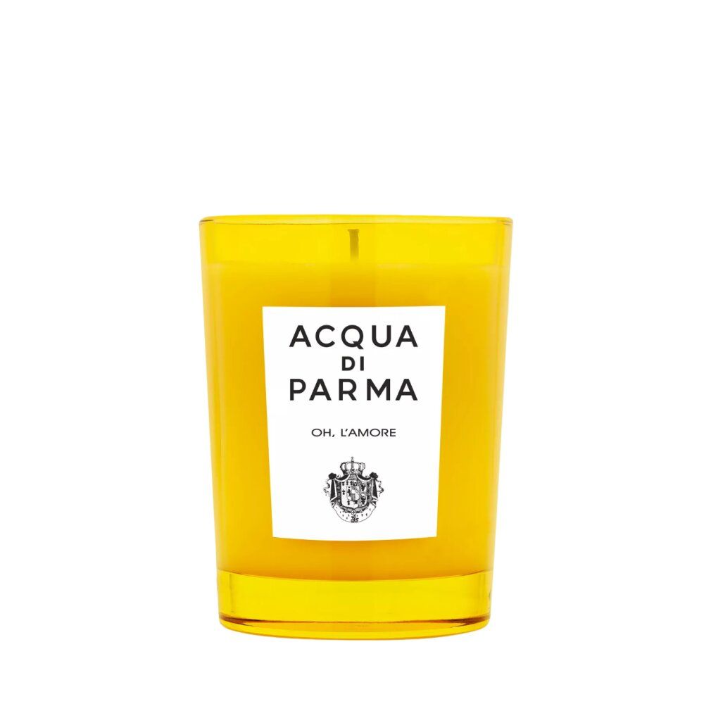 Gelbe Kerze in Glas. Aufschrift: Acqua di Parma, Oh, l'Amore. Gelbes Wachs.