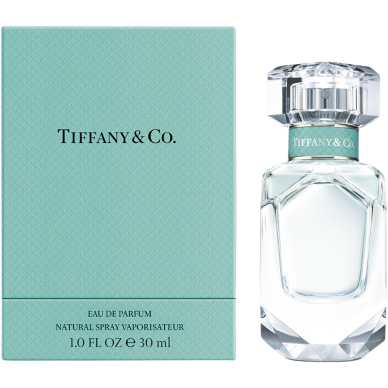Tiffany & Co. Eau de Parfum Flakon und Schachtel. Türkisfarbene Schachtel mit Markenlogo. Glasflakon mit Kristallverschluss.