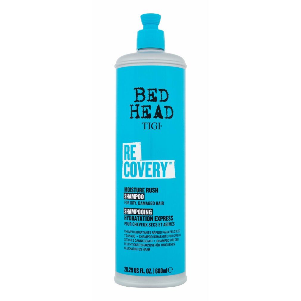 Türkisfarbene Shampoo-Flasche mit weißem Deckel. Aufschrift: Bed Head Tigi Re-covery Moisture Rush Shampoo. Für trockenes, geschädigtes Haar.