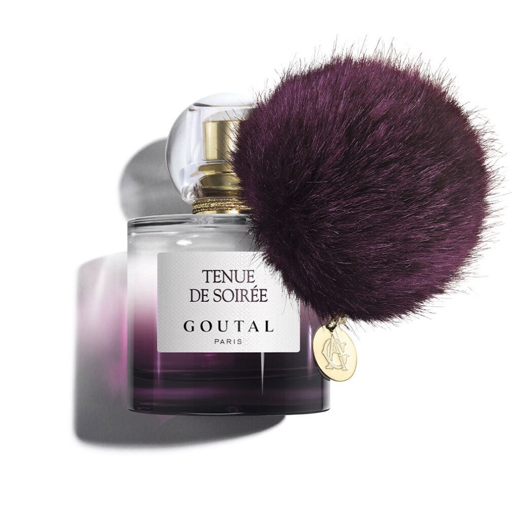 Parfümflakon mit lila Quaste. Aufschrift: Tenue de Soirée, Goutal Paris. Goldfarbener Verschluss.