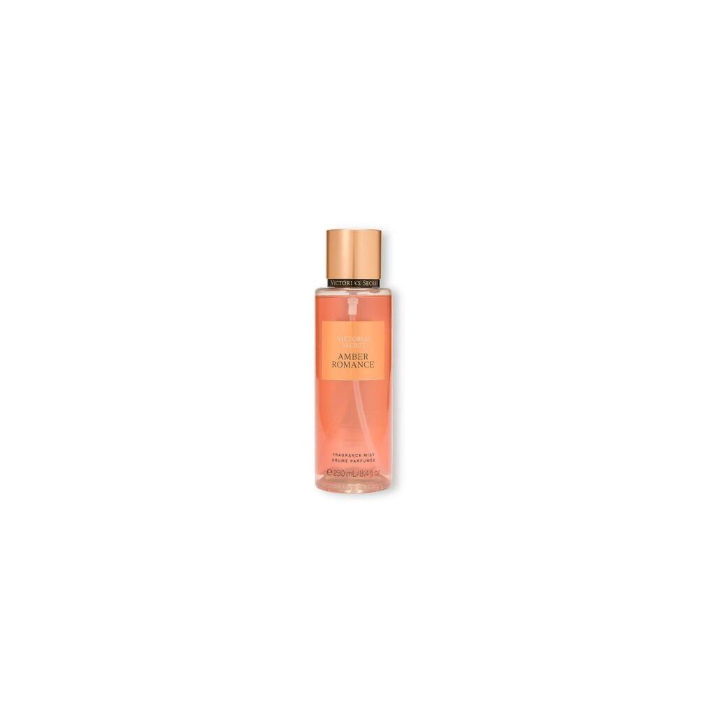 Körpernebel-Flasche, Amber Romance. Goldfarbener Deckel, Sprühkopf. Etikett mit Produktnamen. Transparente Flüssigkeit.