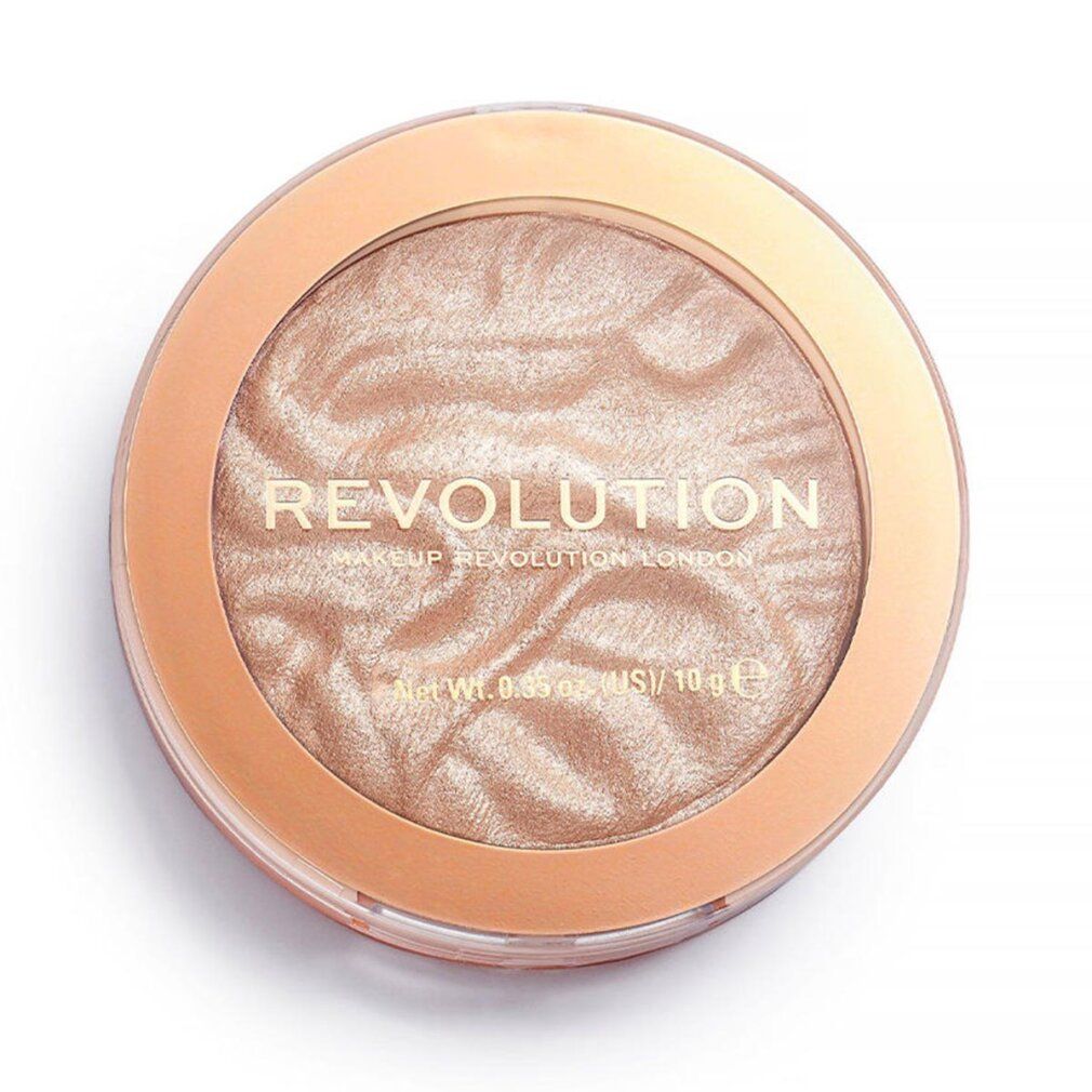 Runder Highlighter in goldfarbener Verpackung. Auf der Oberfläche steht "REVOLUTION". Gewicht: 10 g.