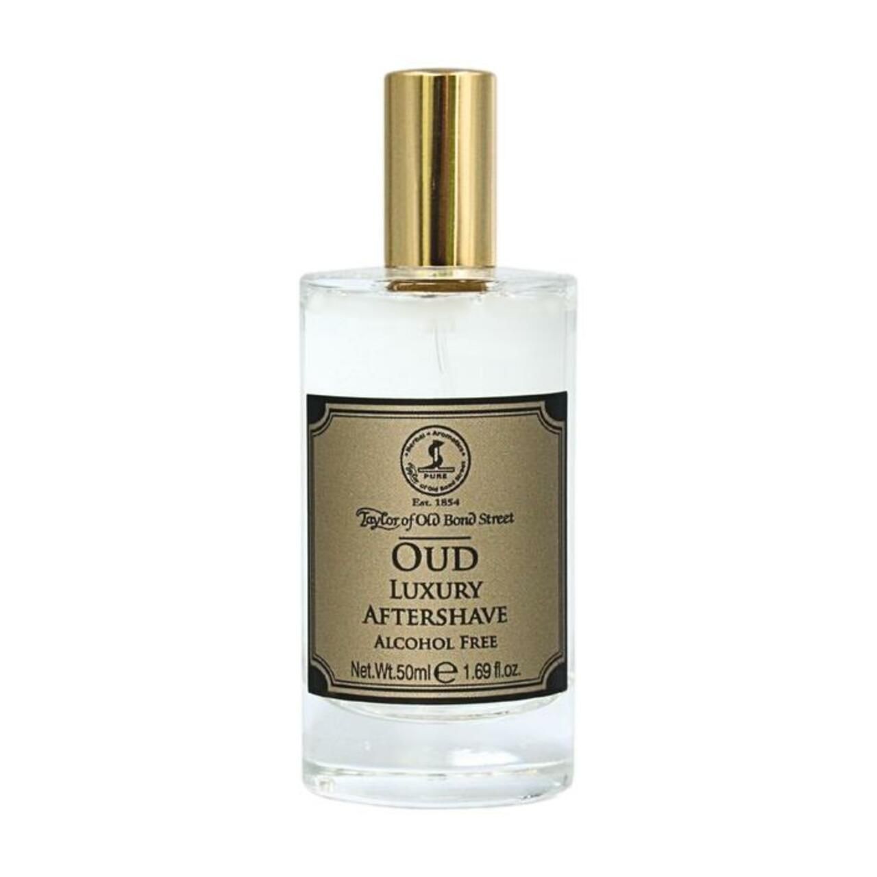 Klarer Glasflakon mit goldfarbenem Verschluss. Etikett mit Text: Oud Luxury Aftershave, Alcohol Free. Marke: Taylor of Old Bond Street.
