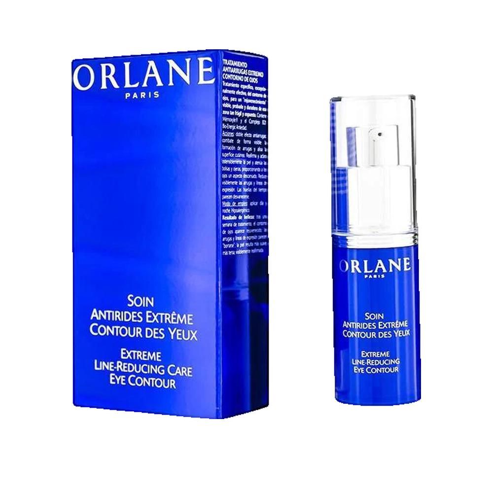 Blaues Produkt mit weißem Aufdruck. Text: ORLANE PARIS, SOIN, EXTREME LINE-REDUCING CARE EYE CONTOUR. Mit Verpackung.